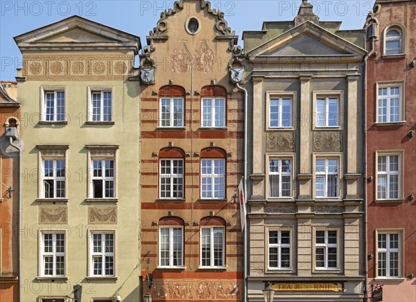 Close-up of facades of townhouses on Dluga street, Gdansk, Gdansk, Poland, Europe