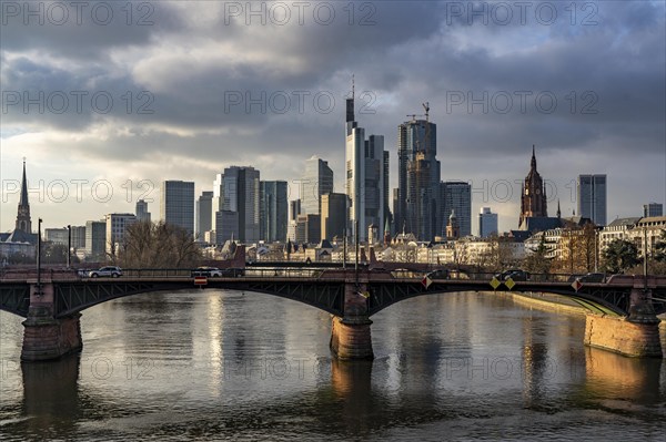 Skyline of the city centre of Frankfurt am Main, river Main, Ignatz-Bubis-Bridge, dusk, Hesse, Germany, Europe