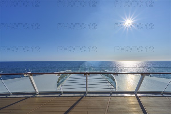 View from the ship's deck, Mein Schiff 6, of the vast sea under bright sunshine and blue skies, North Sea, Norway, Europe