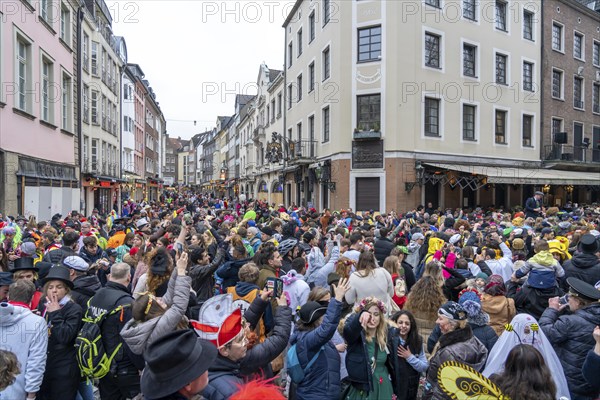 Rose Monday parade in Düsseldorf, after the parade thousands of people in the old town, in the Rheinstraße, at the Altbierbrauerei Uerige, North Rhine-Westphalia, Germany, Europe