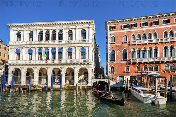 Gondolas and jetty on the Grand Canal, city trip, holiday, travel, tourism, lagoon city, historical, history, architectural history, architecture, historic, famous, attraction, building, gondola, waterway, sightseeing, facade, world heritage site, UNESCO, culture, honeymoon, medieval, flood, environment, cruise, carnival, catholic, Venice, Italy, Europe