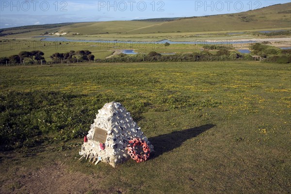 View north east over River Cuckmere valley from Seaford Head, East Sussex, England. Canadian war memorial