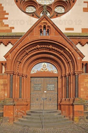 Portal with fittings of the neo-Romanesque St. Lutwinus Church, tympanum, decoration, church door, open staircase, Mettlach, Saarland, Germany, Europe