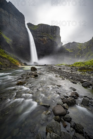 Haifoss and Granni waterfall at a canyon, Fossá í Þjórsárdal, with river í Þjórsárdal, long exposure, dramatic landscape, Hekla, Iceland, Europe