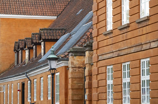 Rusty red historic houses, Frederiksholms Canal, Copenhagen, Denmark, Europe