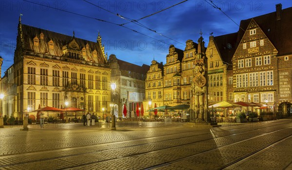 Market square, town hall square with Schütting, town houses and Roland in the historic city centre at dusk, Bremen, Germany UNESCO World Heritage Site