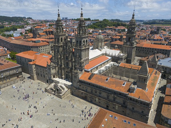 Aerial view of a large square in front of an impressive cathedral, surrounded by historic buildings with red roofs, Cathedral, Santiago de Compostela, autonomous community of Galicia, place of pilgrimage, destination of the Way of St James, Spain, Europe