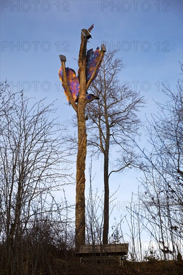 Fire oak artwork by Jürgen Suberg in the Elleringhausen nature reserve, Olsberg, Rothaarsteig, Sauerland, Germany, Europe