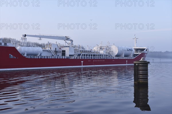 LNG tanker Ramanda sailing in fog in the Kiel Canal, Kiel Canal, Schleswig-Holstein, Germany, Europe