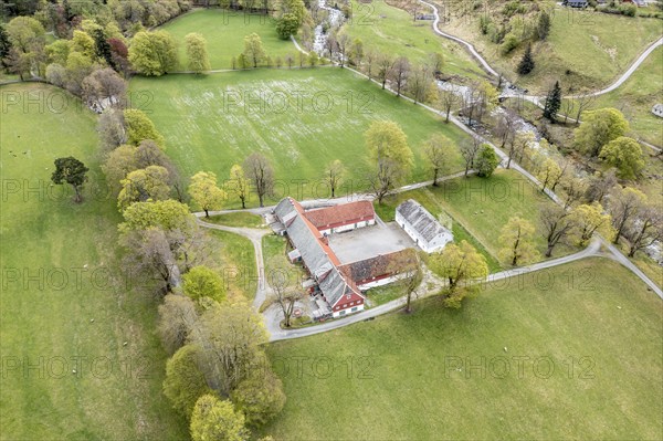 Aerial view of Rosendal Avlsgård og Fruehuset, guesthouse at baroniet Rosendal, old large farm house, village Rosendal, Rogaland, Norway, Europe