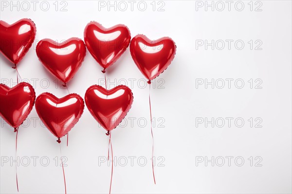 Heart shaped red balloons on white background. KI generiert, generiert, AI generated