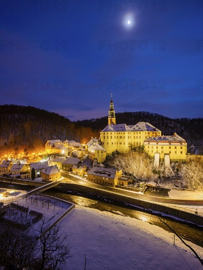 Winter evening in the Müglitz valley, impressively illuminated Weesenstein Castle at the blue hour, Weesenstein, Saxony, Germany, Europe