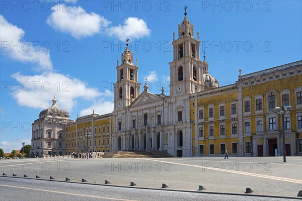 Large square in front of a baroque palace with magnificent architecture under a clear sky, National Palace, Palácio Nacional de Mafra, Lisbon, Lisboa, Portugal, Europe