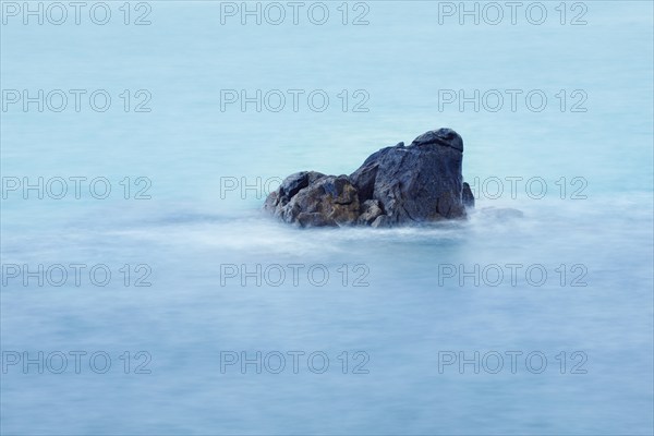 Rock surrounded by water in the sea, Bretgane, France, Europe