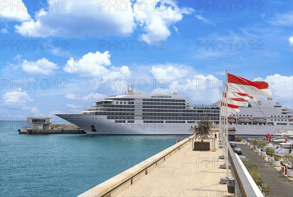 Monte Carlo, Monaco, France, 22 June, 2022: Luxury cruise ship heading to vacation from Monaco Monte Carlo Port Hercules, Europe