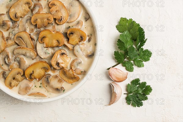 Champignons in creamy garlic sauce, with herbs and spices, gravy, sauce, no people