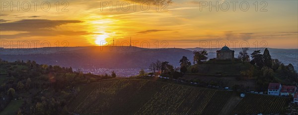 Sunset at the burial chapel on the Württenberg, the television tower on the horizon. Aerial view, panoramic photo. The mausoleum was built between 1820 and 1824 to a design by the court architect Giovanni Salucci. Stuttgart, Baden-Württemberg, Germany, Europe