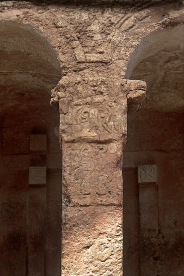 Stone-carved column at the entrance to the monolithic Bete Maryam rock-hewn church, UNESCO World Heritage Site Lalibela, Ethiopia, Africa