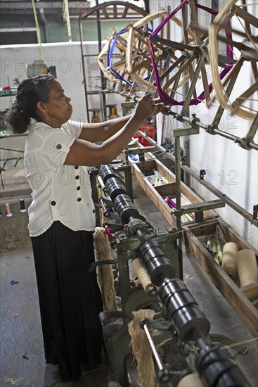 Sri Lankan woman in a weaving mill, Selyn Textiles, Kurunegala, North West Province, Sri Lanka, Asia