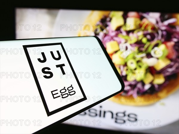 Stuttgart, Germany, 07-11-2024: Mobile phone with logo of American food technology company Eat Just Inc. (Just Egg) in front of website. Focus on center-left of phone display, Europe