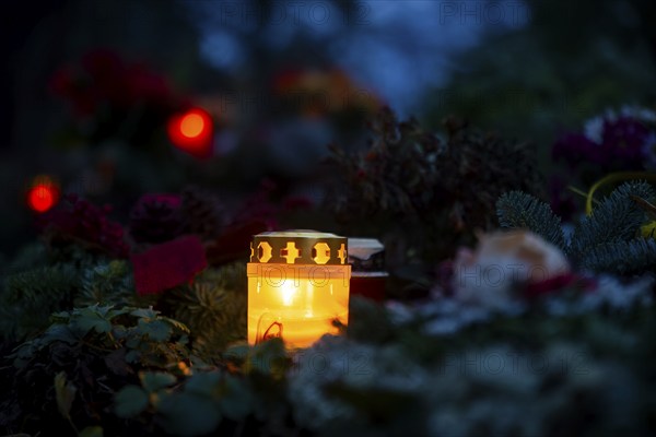 Grave lights on Sunday of the dead at the cemetery in Possendorf. Possendorf, Saxony, Germany, Europe