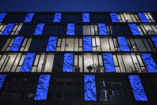 Night shot of Bülow Carré façade, building with near-surface concrete core temperature control from REHAU, Stuttgart, Baden-Württemberg, Germany, Europe