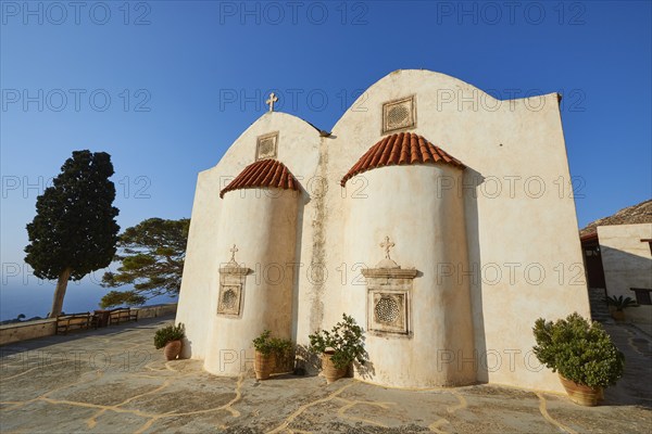 Super wide angle, Two-nave chapel, Red tiled roofs, Cloudless blue sky, Tree, Preveli, Orthodox monastery, South coast, Rethimnon province, Crete, Greece, Europe