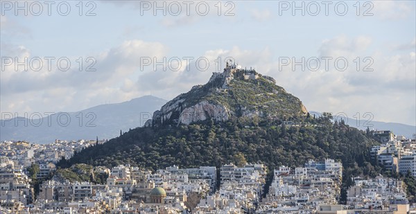 View over houses of Athens with Mount Lycabettus, Athens, Attica, Greece, Europe