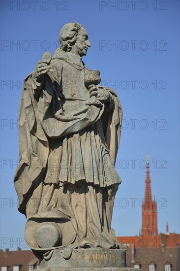 Sculpture Saint Charles Borromeo, Cardinal, Bishop of Milan, Italian, blurred Lady Chapel, Old Main Bridge, Würzburg, Lower Franconia, Franconia, Bavaria, Germany, Europe