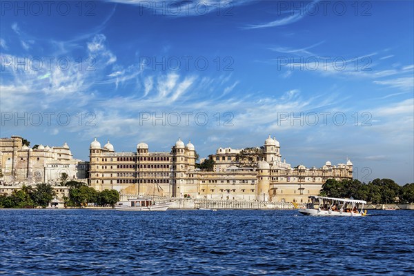 India luxury tourism concept background, Udaipur City Palace from Lake Pichola. Udaipur, Rajasthan, India, Asia