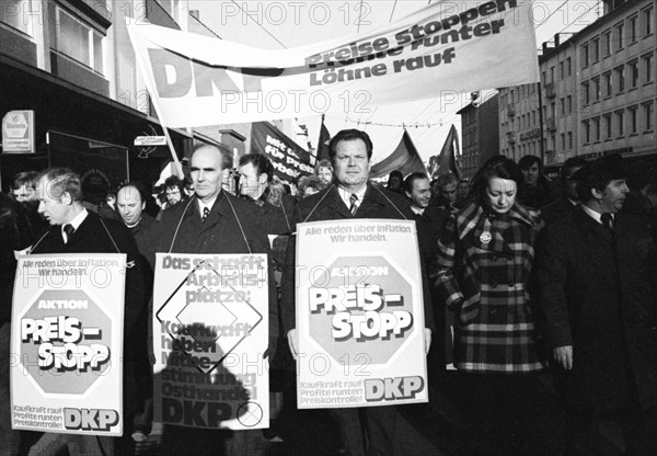 Supporters and functionaries of the DKP demonstrated for a price freeze of communal and general prices on 18.01.1975 in Solingen.Herbert Mies (m.) Kurt Bachmann 2nd from left, Germany, Europe