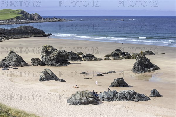 Sandy beach with rocks near Durness, Sutherland, Scottish Highlands, Scotland, UK