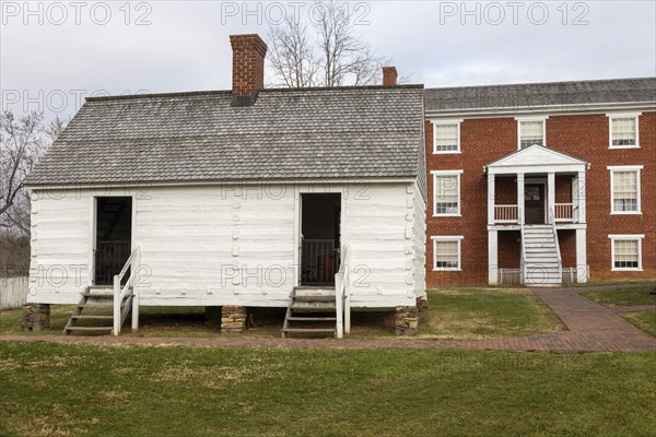 Appomattox, Virginia, Appomattox Court House National Historical Park, site of General Robert E. Lee's surrender to General Ulysses S. Grant in 1865 to end the American Civil War. Behind the brick McLean house, where the surrender occurred, is a cabin where his two enslaved families lived