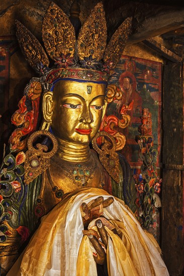 Maitreya Buddha statue close up Tibetan monastery Thiksey Gompa. Ladakh, Jammu and Kashmir, India, Asia