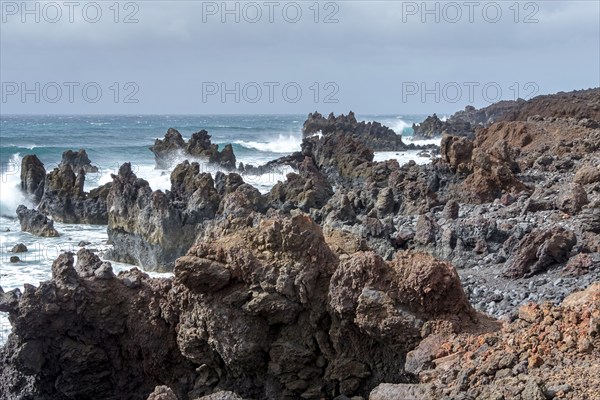 Lava rocks in the sea, surf, near Los Hervideros, Lanzarote, Canary Islands, Spain, Europe