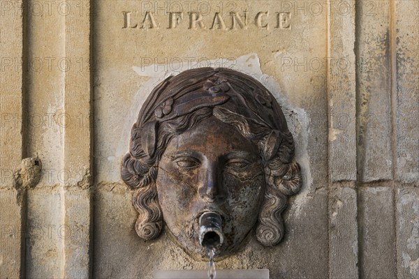 Old fountain with la france lettering, Venasque, Département Vaucluse, Provence, Provence-Alpes-Côte d'Azur, France, Europe