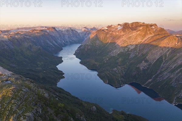 View from Seiskallåfjellet into the Nordfjorden, evening mood, Svartisen Glacier in the background, Saltfjellet Svartisen National Park, Helgeland Coast, Rødøy, Nordland, Norway, Europe