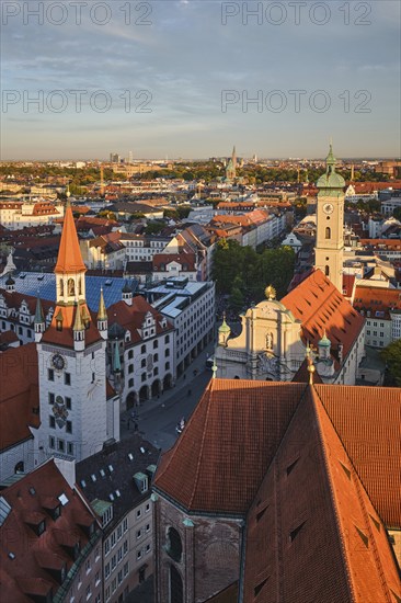 Aerial view of Munich, Marienplatz and Altes Rathaus from St. Peter's church on sunset. Munich, Germany, Europe