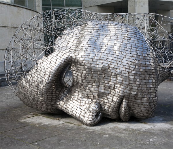 Head sculpture by artist Rick Kirby in Calne town centre, north Wiltshire, England installed in 2001