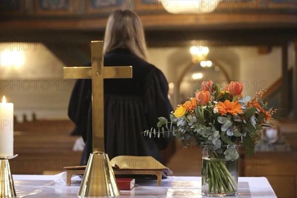 Vicar Lara Schmidt holds the Sunday service in the Protestant parish of Mutterstadt, Rhineland-Palatinate
