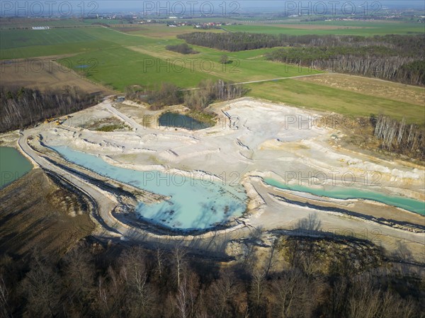 The Blue Hole, a residual hole from the kaolin mining operations of Kaolin- und Tonwerke Seilitz-Löthain GmbH, is now a natural paradise, but can only be entered by anglers, Ockrilla, Saxony, Germany, Europe