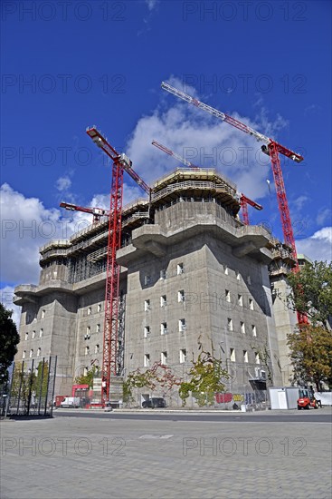 Europe, Germany, Hanseatic City of Hamburg, St. Pauli, former bunker on Feldstrasse, construction work, conversion and extension to a hotel and event centre, exterior design to create a green bunker, opening 2024, Europe