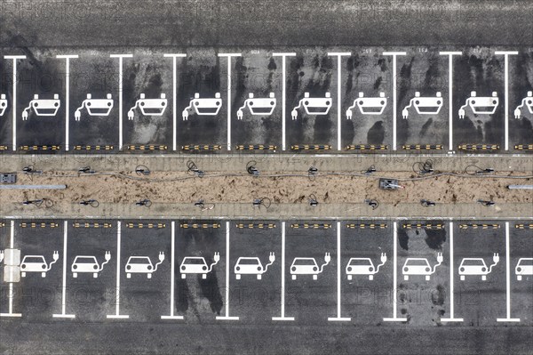 Aerial view of charging stations for electric cars at the Tesla Gigafactory in Grünheide, 28 01 2023