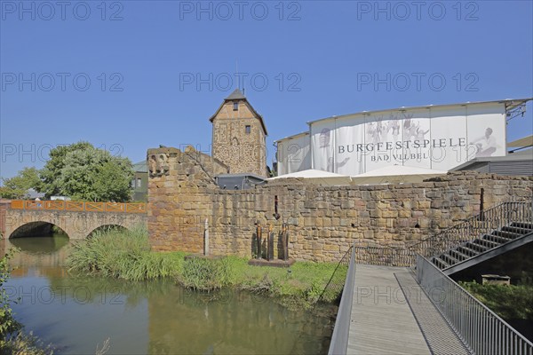 Moated castle built in the 12th century and landmark during the castle festival, festival, inscription with banner, bridge, footbridge, pond, Bad Vilbel, Wetterau, Hesse, Germany, Europe
