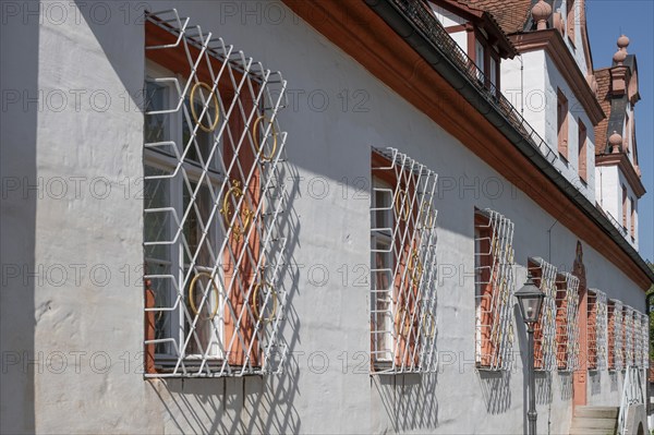 Grilles in front of the windows of the former chancellery and banqueting hall wing of the ducal residence, then rent office, now tax office, Spitalwinkel 3, Hiltpoltstein, Middle Franconia, Bavaria, Germany, Europe