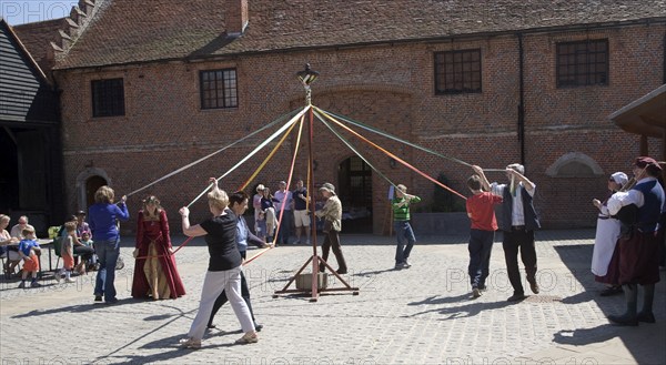 People maypole dancing during Tudor history re-enactment day, Layer Marney Tower, Essex, England, United Kingdom, Europe
