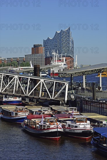 Europe, Germany, Hamburg, Elbe, St. Pauli Landungsbrücken, view of the Elbe Philharmonic Hall, Hamburg's new concert hall, barges for harbour cruises, Hamburg, Hamburg, Federal Republic of Germany, Europe