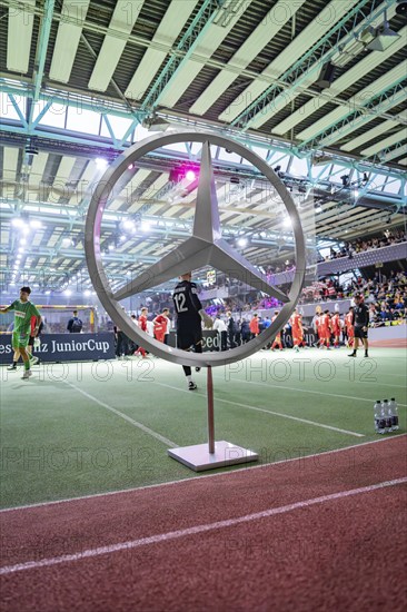 A large brand logo dominates the centre of the sporting event, Mercedes Benz Junior Cup, Glaspalast Sindelfingen, Germany, Europe