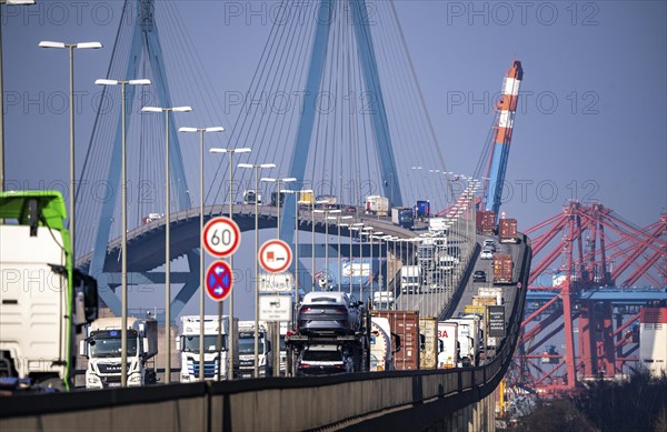Traffic on the Köhlbrand Bridge in the port of Hamburg, spans the 325 m wide Köhlbrand, an arm of the Süderelbe, the bridge is over 3600 metres long, 53 metres above the water, piers 135 m high, more than 30, 000 vehicles use the B3 bridge daily, important connection to the port, it is dilapidated, to be rebuilt, Hamburg, Germany, Europe