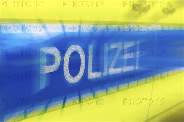 Police car, police lettering on an emergency vehicle, logo, blur, Baden-Württemberg, Germany, Europe